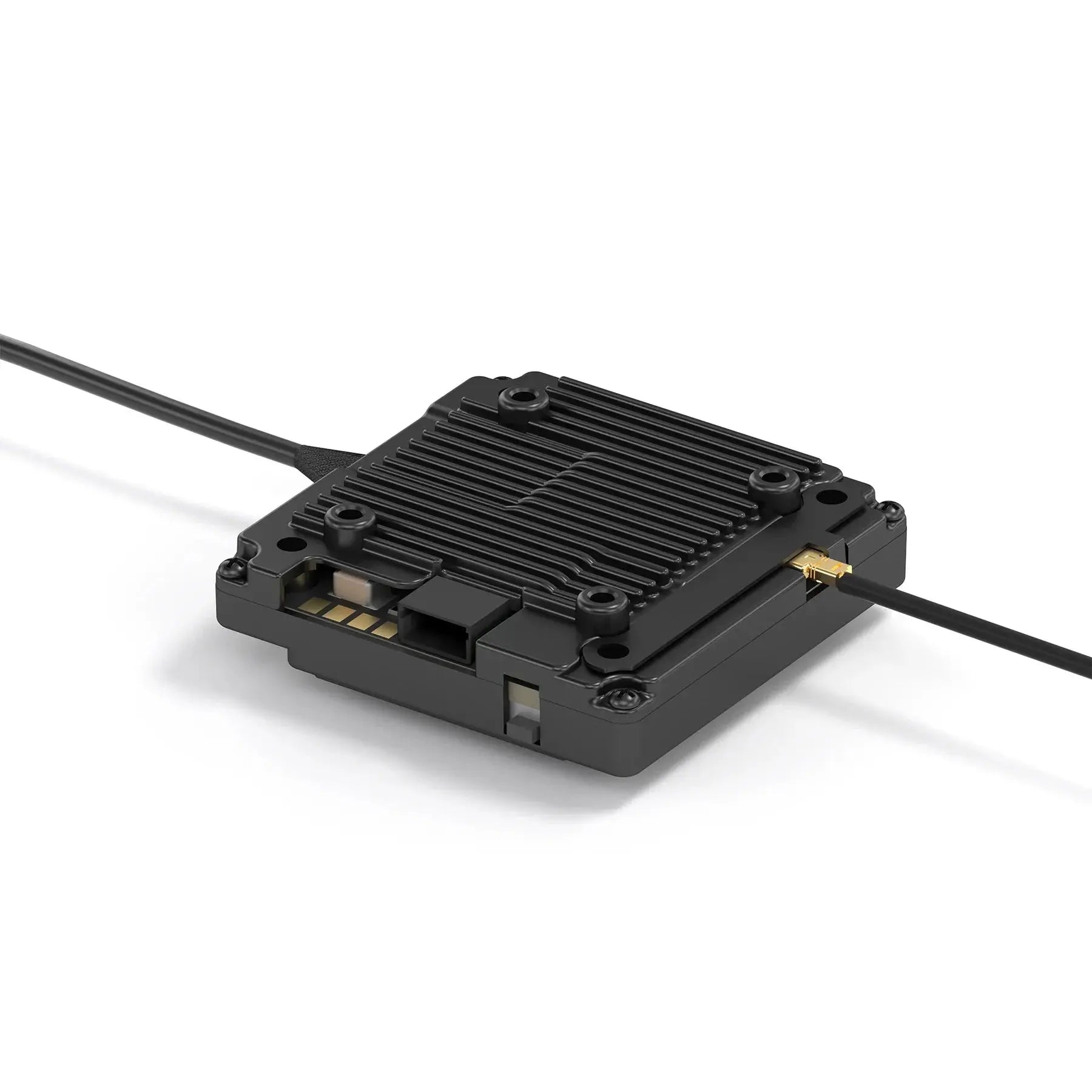 The HeadphoneHeat WalkSnail Avatar Pro Night Vision Edition HD is a compact black module with a ribbed rectangular casing for FPV goggles, 1080P 120fps support, and two cables—one USB and one gold connector—resting on a white surface.