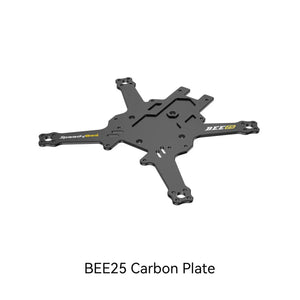 The HeadphoneHeat SpeedyBee 25 Protection Ring / Carbon Plate is a black carbon fiber drone plate with four extended arms, featuring “SpeedyBee” and “BEE25” text. Perfect as a Bee25 replacement or with propeller guards for extra protection. "BEE25 Carbon Plate" below.