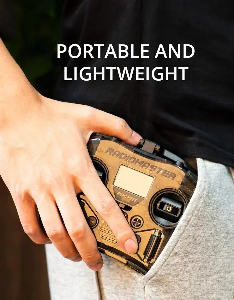 A hand slips the compact HeadphoneHeat RadioMaster Pocket ELRS 2.4G FPV Controller into a grey pants pocket, with “PORTABLE AND LIGHTWEIGHT” above.