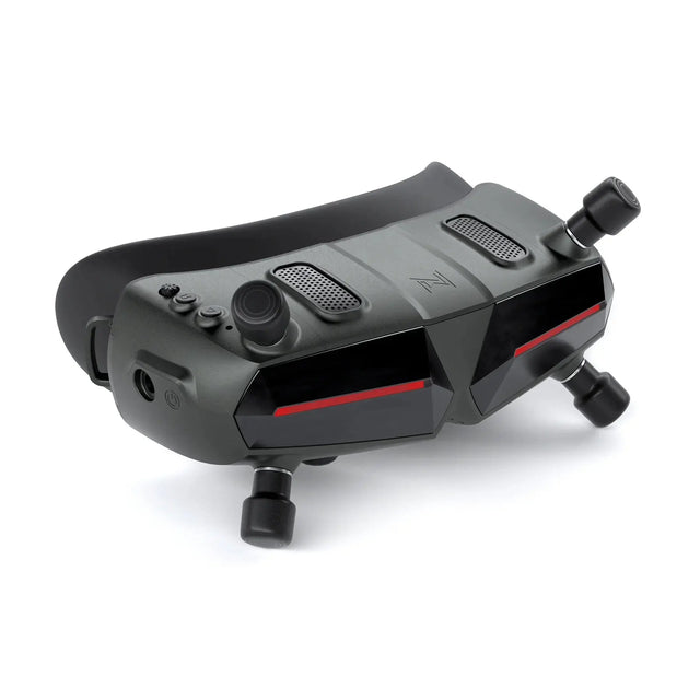 The HeadphoneHeat WalkSnail Avatar Pro Night Vision Edition HD are black FPV goggles with dual front cameras, buttons, two antennas, and 1080P 120fps support for immersive experiences or remote drone piloting.